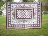 Floral Patchwork Quilt with Purple Back