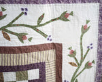 Floral Patchwork Quilt with Purple Back