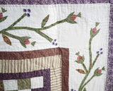 Floral Patchwork Quilt with Purple Back