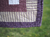 Floral Patchwork Quilt with Purple Back