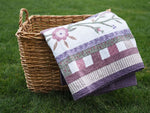 Floral Patchwork Quilt with Purple Back