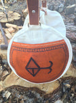 Our Rodeo Gear Bag measures 24"x12". This bag is built from our heavy 15 ounce canvas, has a #10  brass zipper, handles with a leather grip, leather shoulder strap and two leather end pockets that can be customized.