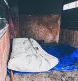 J bar D Canvas Bedroll laid out in a barn ready to be slept in. 