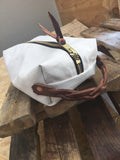 This J bar D Canvas and Leather Shave/Cosmetic Canvas Bag is built for your cosmetic supplies.
