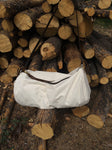 The Original Gear Bag is constructed with 10.10 ounce Army Duck Canvas and leather strap. It has a pocket on each end and a heavy duty #10 brass zipper, this bag measures 24 inches long by 12 inches deep.