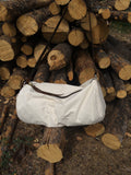 The Original Gear Bag is constructed with 10.10 ounce Army Duck Canvas and leather strap. It has a pocket on each end and a heavy duty #10 brass zipper, this bag measures 24 inches long by 12 inches deep.