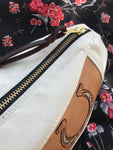 This Canvas and Leather Cantle Bag sits nicely on the back of your saddle, with a custom designed leather patch. Otherwise known as medicine bags or saddle bags.