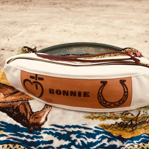 This Canvas and Leather Cantle Bag sits nicely on the back of your saddle, with a custom designed leather patch. Otherwise known as medicine bags or saddle bags.